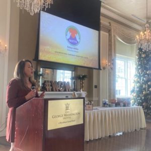 01.10.23 Robyn speaking at WOW (Women of Winchester) luncheon as the featured non-profit (crop)